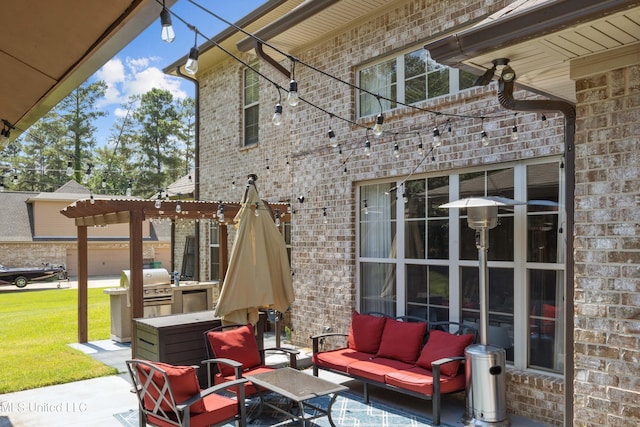 view of patio / terrace with exterior kitchen, grilling area, and an outdoor hangout area