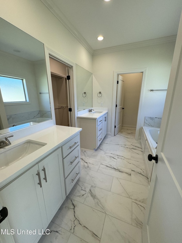 412 Butternut Dr Unit 184, Canton, MS 39046 - full bath featuring ornamental molding, two vanities, marble look tile flooring, recessed lighting, and a bathtub