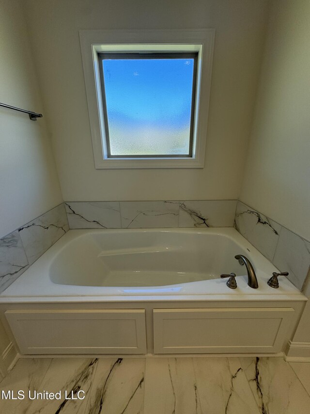 412 Butternut Dr Unit 184, Canton, MS 39046 - bathroom with a bath and marble finish flooring