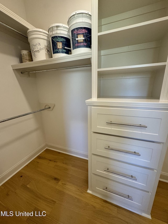412 Butternut Dr Unit 184, Canton, MS 39046 - walk in closet featuring wood finished floors