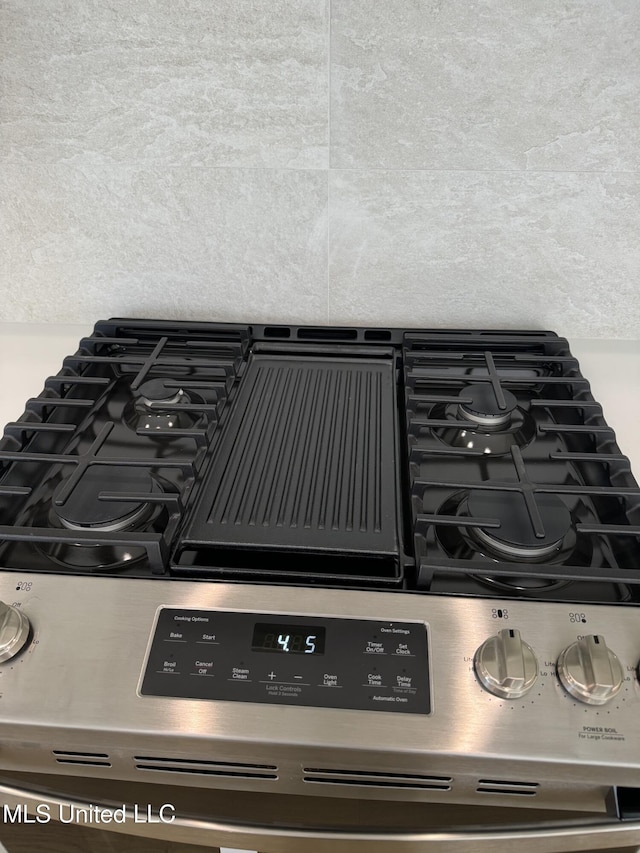 412 Butternut Dr Unit 184, Canton, MS 39046 - kitchen view of stainless steel range with gas cooktop