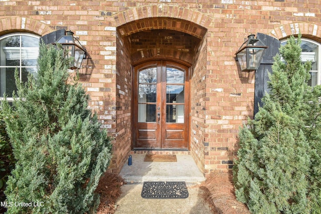 property entrance featuring french doors