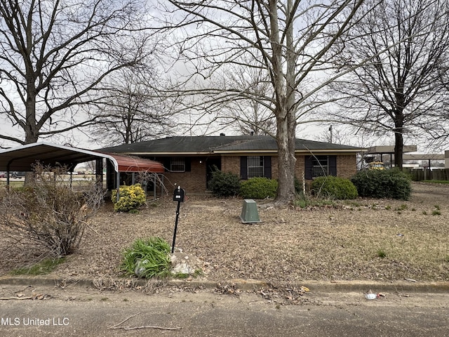 704 Oak Ave, Ruleville, MS 38771 - single story home with a carport and brick siding
