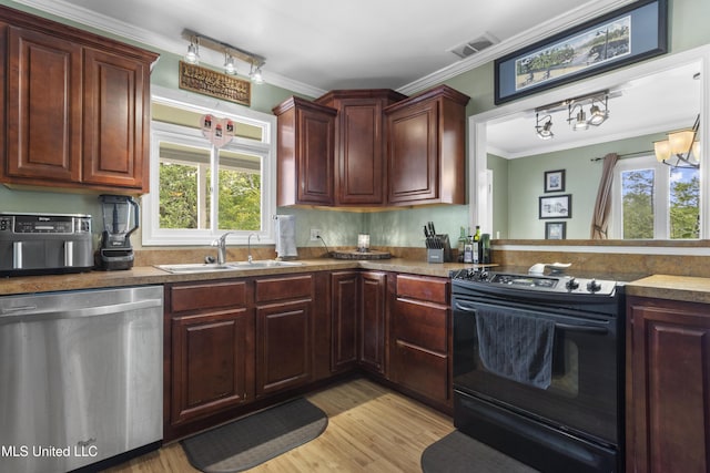 4620 Holly Heath Dr, Gautier, MS 39553 - kitchen featuring dishwasher, black electric range, a sink, plenty of natural light, and crown molding