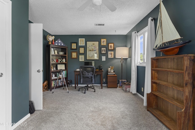 4620 Holly Heath Dr, Gautier, MS 39553 - home office featuring carpet, ceiling fan, a textured ceiling, and baseboards