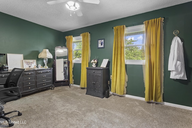4620 Holly Heath Dr, Gautier, MS 39553 - carpeted office featuring ceiling fan, a textured ceiling, and baseboards