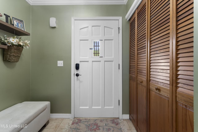 4620 Holly Heath Dr, Gautier, MS 39553 - entrance foyer with baseboards, crown molding, and light tile patterned flooring