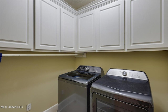 138 Oak Ridge Cir, Madison, MS 39110 - laundry area featuring separate washer and dryer, cabinet space, and baseboards