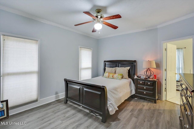 138 Oak Ridge Cir, Madison, MS 39110 - bedroom featuring wood finished floors, ornamental molding, ceiling fan, and baseboards