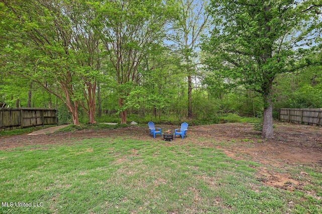 138 Oak Ridge Cir, Madison, MS 39110 - view of yard featuring an outdoor fire pit