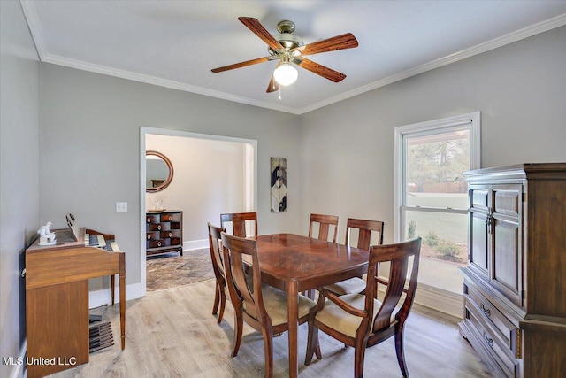 138 Oak Ridge Cir, Madison, MS 39110 - dining room featuring light wood-style floors, ornamental molding, ceiling fan, and baseboards
