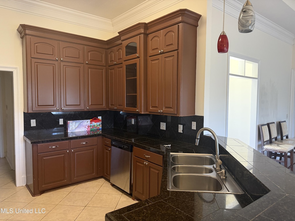 341 Austin Cir, Brandon, MS 39047 - kitchen featuring dishwasher, crown molding, a sink, backsplash, and tile countertops