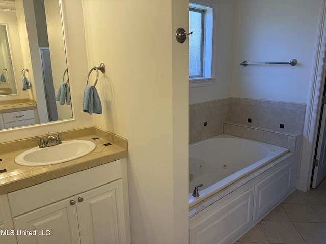 341 Austin Cir, Brandon, MS 39047 - full bathroom with tile patterned flooring, a jetted tub, and vanity
