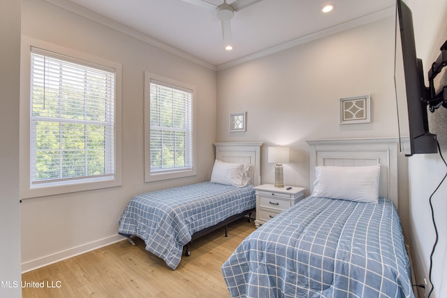 bedroom with light wood finished floors, baseboards, recessed lighting, a ceiling fan, and crown molding