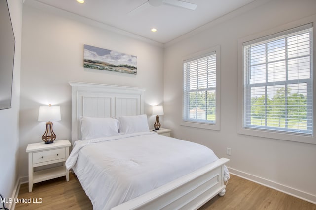 bedroom featuring light wood finished floors, baseboards, recessed lighting, and ceiling fan