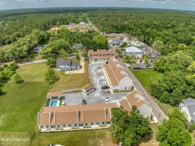 bird's eye view with a view of trees