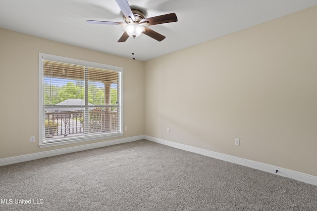 13239 Tyler Ln, Gulfport, MS 39503 - carpeted empty room with ceiling fan and baseboards