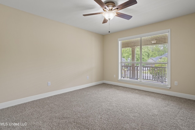 13239 Tyler Ln, Gulfport, MS 39503 - spare room featuring carpet floors, baseboards, and ceiling fan