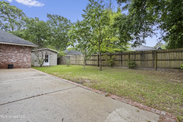 13239 Tyler Ln, Gulfport, MS 39503 - view of yard with an outbuilding and a patio area