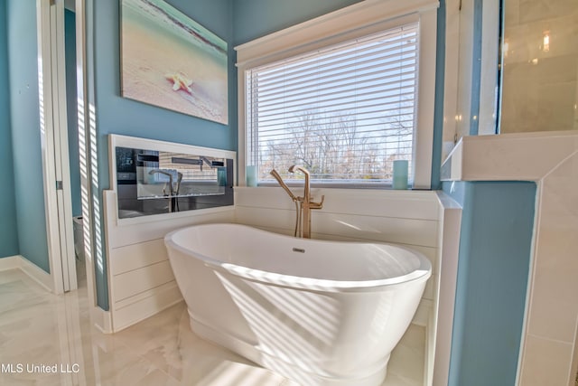 bathroom featuring a bathing tub