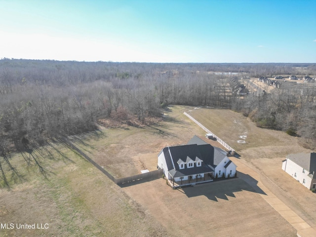 birds eye view of property with a rural view