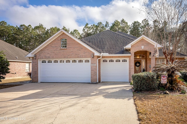 view of front of property featuring a garage