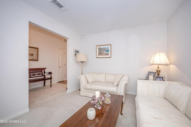 living room with light colored carpet