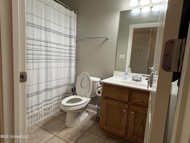 full bathroom with vanity, toilet, tile patterned flooring, and shower / tub combo with curtain