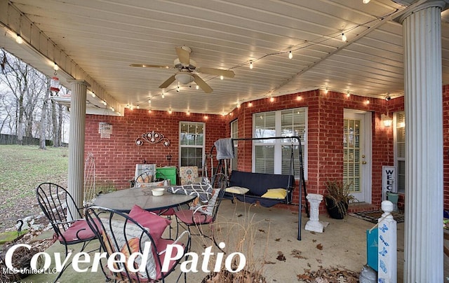 view of patio with a ceiling fan and outdoor dining space