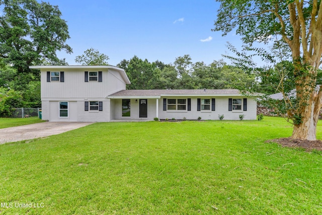 120 Clower Ave, Long Beach, MS 39560 - split level home with brick siding and concrete driveway