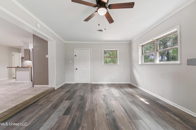 120 Clower Ave, Long Beach, MS 39560 - spare room with wood finished floors, ceiling fan, and crown molding