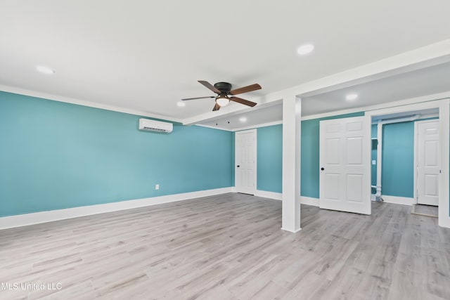 120 Clower Ave, Long Beach, MS 39560 - unfurnished living room featuring ceiling fan, a wall mounted AC, light wood-type flooring, recessed lighting, and crown molding