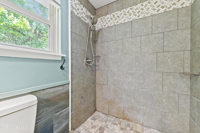 120 Clower Ave, Long Beach, MS 39560 - full bathroom featuring a tile shower and toilet