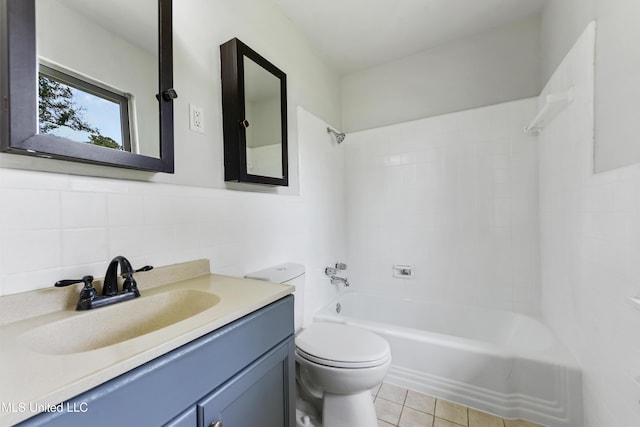 120 Clower Ave, Long Beach, MS 39560 - bathroom featuring washtub / shower combination, vanity, tile walls, and tile patterned floors