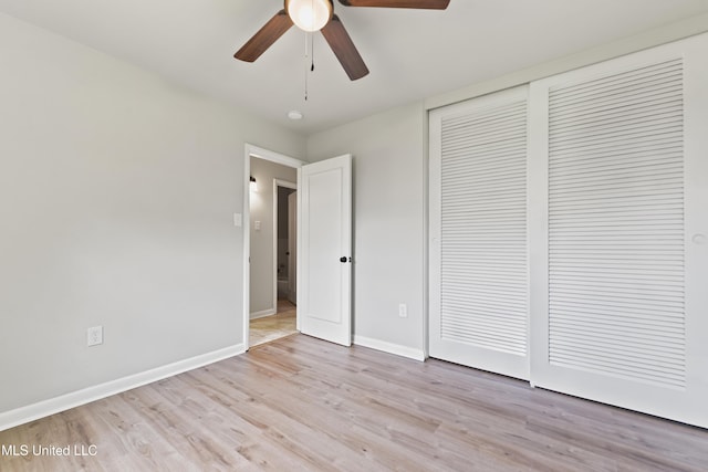 120 Clower Ave, Long Beach, MS 39560 - unfurnished bedroom with a closet, wood finished floors, and a ceiling fan
