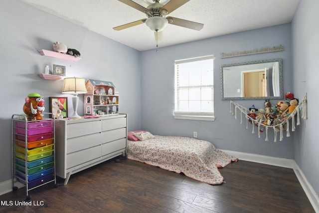 bedroom with baseboards, a ceiling fan, and wood finished floors