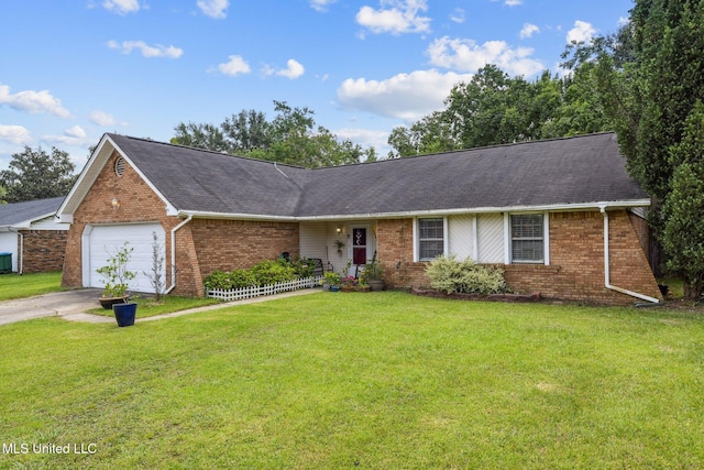 single story home featuring brick siding, a garage, and a front lawn