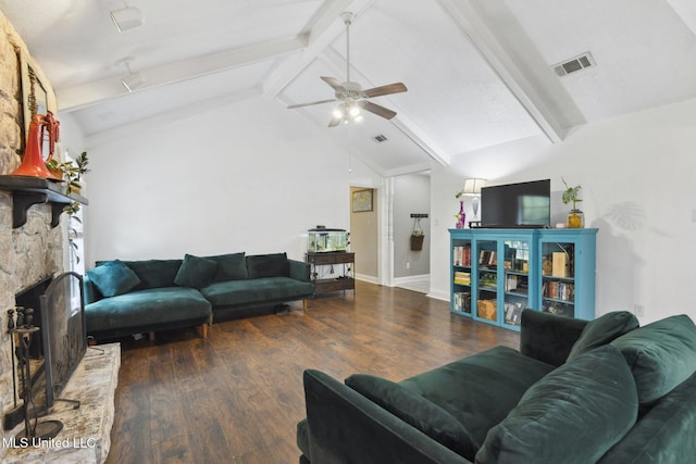 living area featuring a ceiling fan, visible vents, a fireplace, wood finished floors, and lofted ceiling with beams