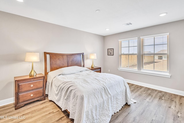 bedroom featuring light hardwood / wood-style flooring