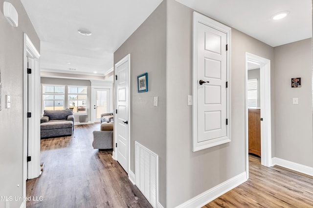 hallway with light wood-type flooring