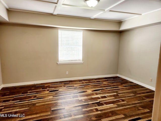 unfurnished room featuring dark hardwood / wood-style floors and coffered ceiling