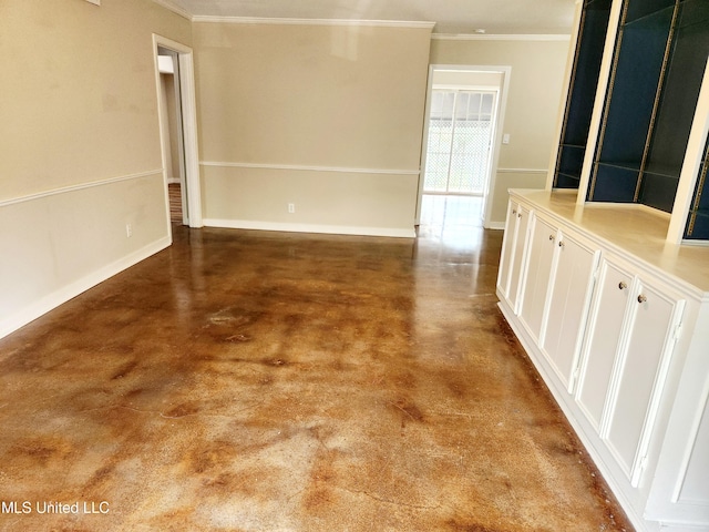 spare room with crown molding