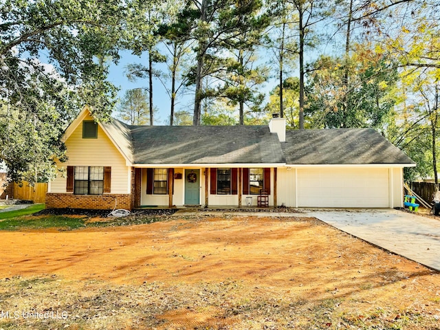 ranch-style home featuring a garage and a porch