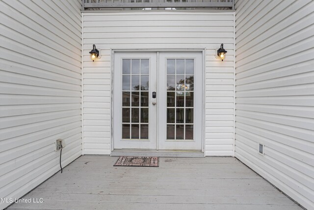 property entrance with french doors and a deck