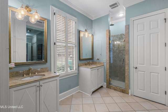 bathroom featuring tile patterned flooring, vanity, crown molding, and a shower with shower door