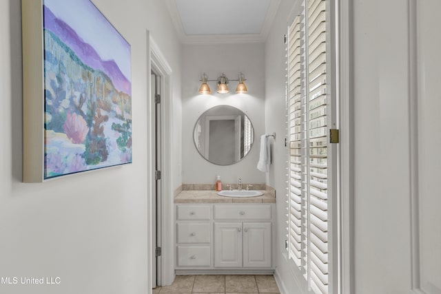 bathroom featuring vanity, tile patterned floors, and ornamental molding