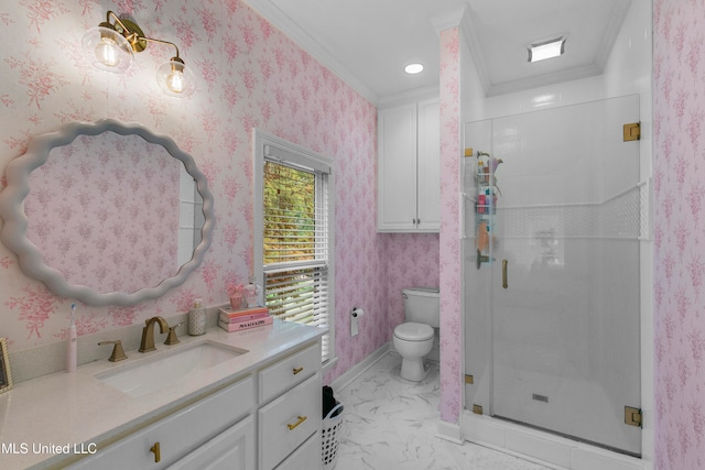 bathroom featuring a shower with shower door, vanity, toilet, and ornamental molding