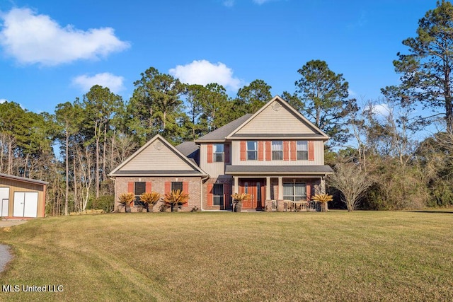 view of front of house featuring brick siding, covered porch, and a front yard