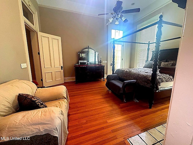 751 S Main St, Grenada, MS 38901 - bedroom featuring wood-type flooring and a ceiling fan