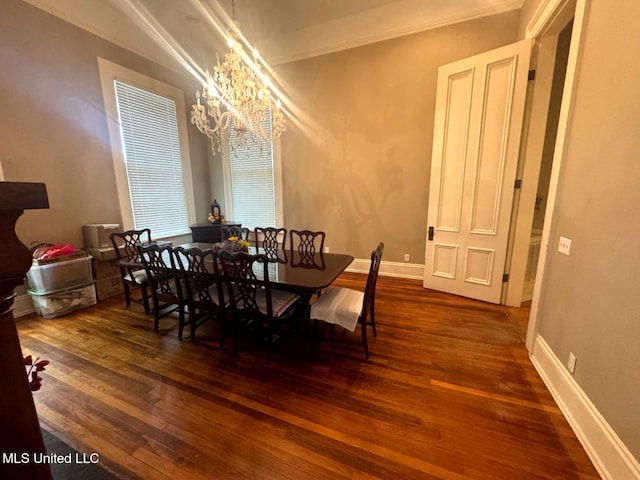 751 S Main St, Grenada, MS 38901 - dining space with wood-type flooring, a chandelier, baseboards, and ornamental molding